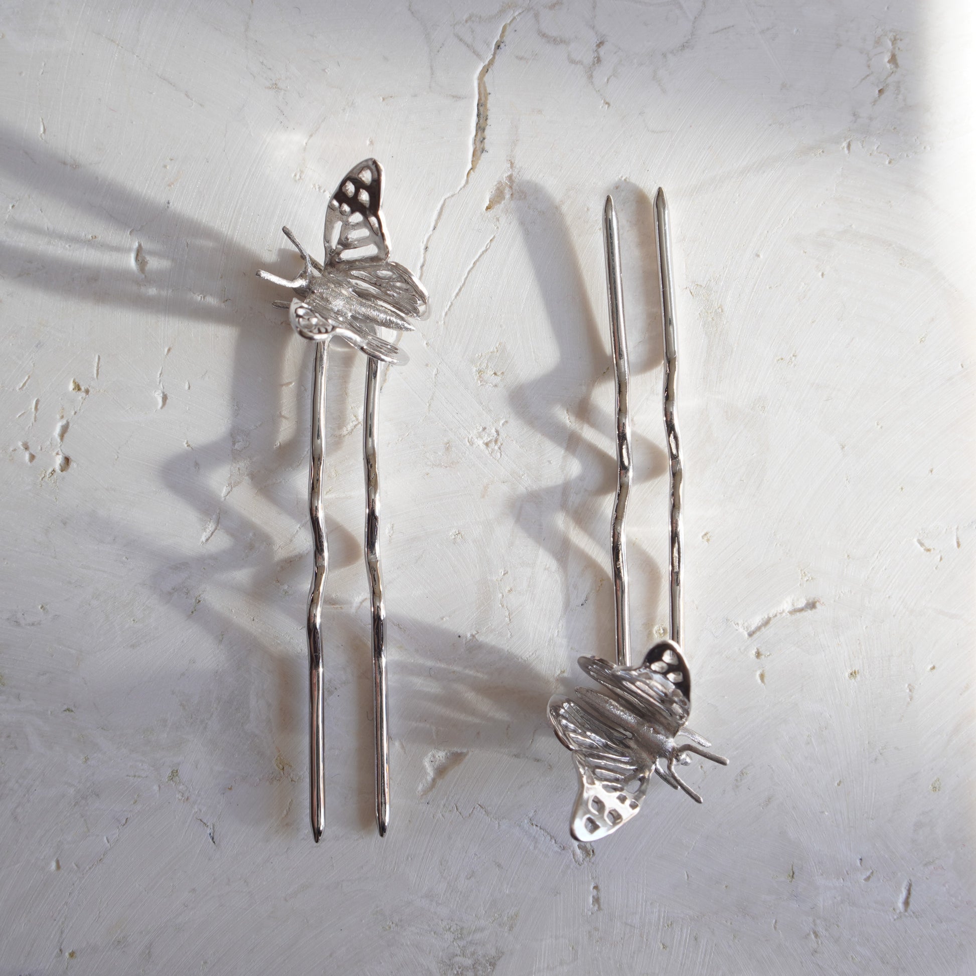Horquillas de plata de ley Papillon.